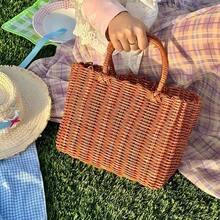 大容量镂空透气手工编织手提篮，原创装饰，天然镂空设计，手提式，质朴自然风格，开放式编织篮，适合家居收纳，乡村风格家居爱好者，手工艺爱好者，野餐露营，市场摊贩，适用于厨房、餐厅、阳台、花园、商业店铺展示、礼品赠送。款式随机发货。 - 彩色 - 查看 3