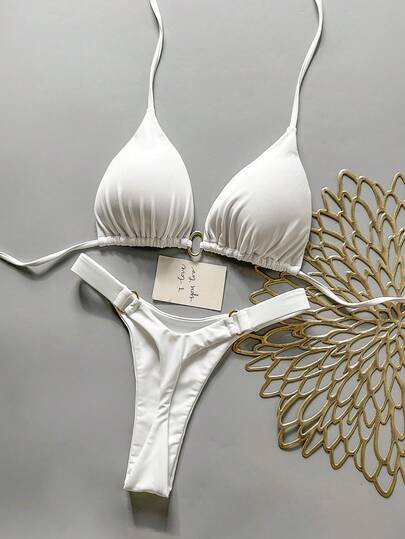 Bộ bikini gợi cảm màu trơn dành cho nữ, thích hợp mặc đi biển mùa hè.