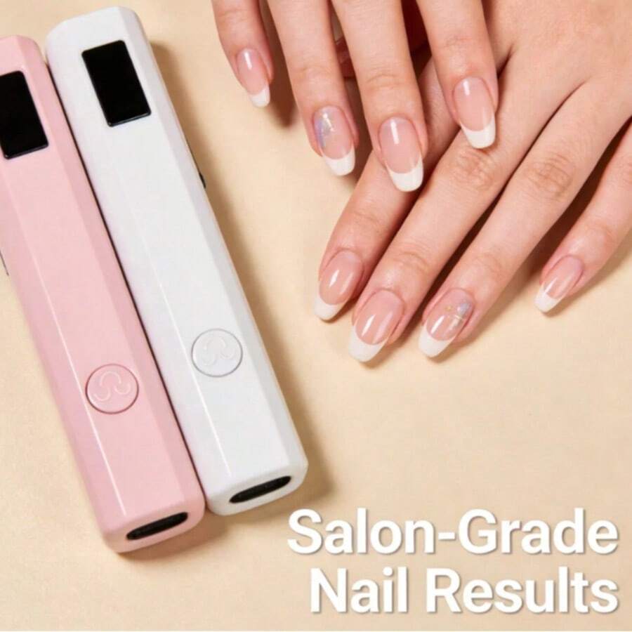 Quick-Drying Mini Nail Lamp With USB Rechargeable LED Display, Available In White And Pink. Conveniently Powered, This Mini Handheld Nail Lamp Features A Timer And Won't Darken Your Hands. Perfect For Home Use, It Dries Nail Polish Quickly And Is Ideal For Families And Nail Technicians. It Also Makes A Great Gift For Family And Friends. - White - View 1