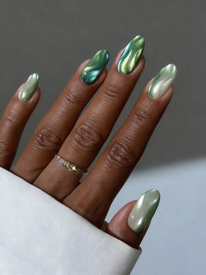 Bộ 24 miếng dán móng tay acrylic hình bầu dục ngắn, màu xanh lá cây ánh mắt mèo, kiểu móng giả gợn sóng gradient, kèm 1 lọ keo dán và 1 dũa móng, thích hợp cho các bữa tiệc, sự kiện, sử dụng hàng ngày, phù hợp cho tiệc độc thân, dạ hội, và trang phục thường ngày. Móng tay giả có thể tháo rời và tái sử dụng.