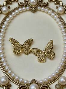 1 Pair Unique Hollow-Out Gold Butterfly Studs - White - View 5