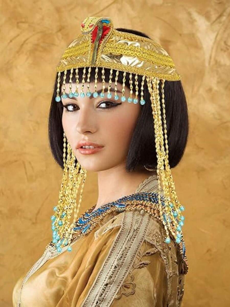 Phụ nữ thường đội băng đô Ai Cập đính hạt hình rắn và mặc trang phục Ai Cập cũng được trang trí bằng hạt cườm. Băng đô Ai Cập này phù hợp cho nhiều dịp khác nhau, chẳng hạn như các bữa tiệc hóa trang Halloween, tiệc nhập vai, trò chơi sân khấu, tiệc theo chủ đề và các bữa tiệc, sự kiện nổi tiếng khác liên quan đến Ai Cập. - Vàng - Xem 1