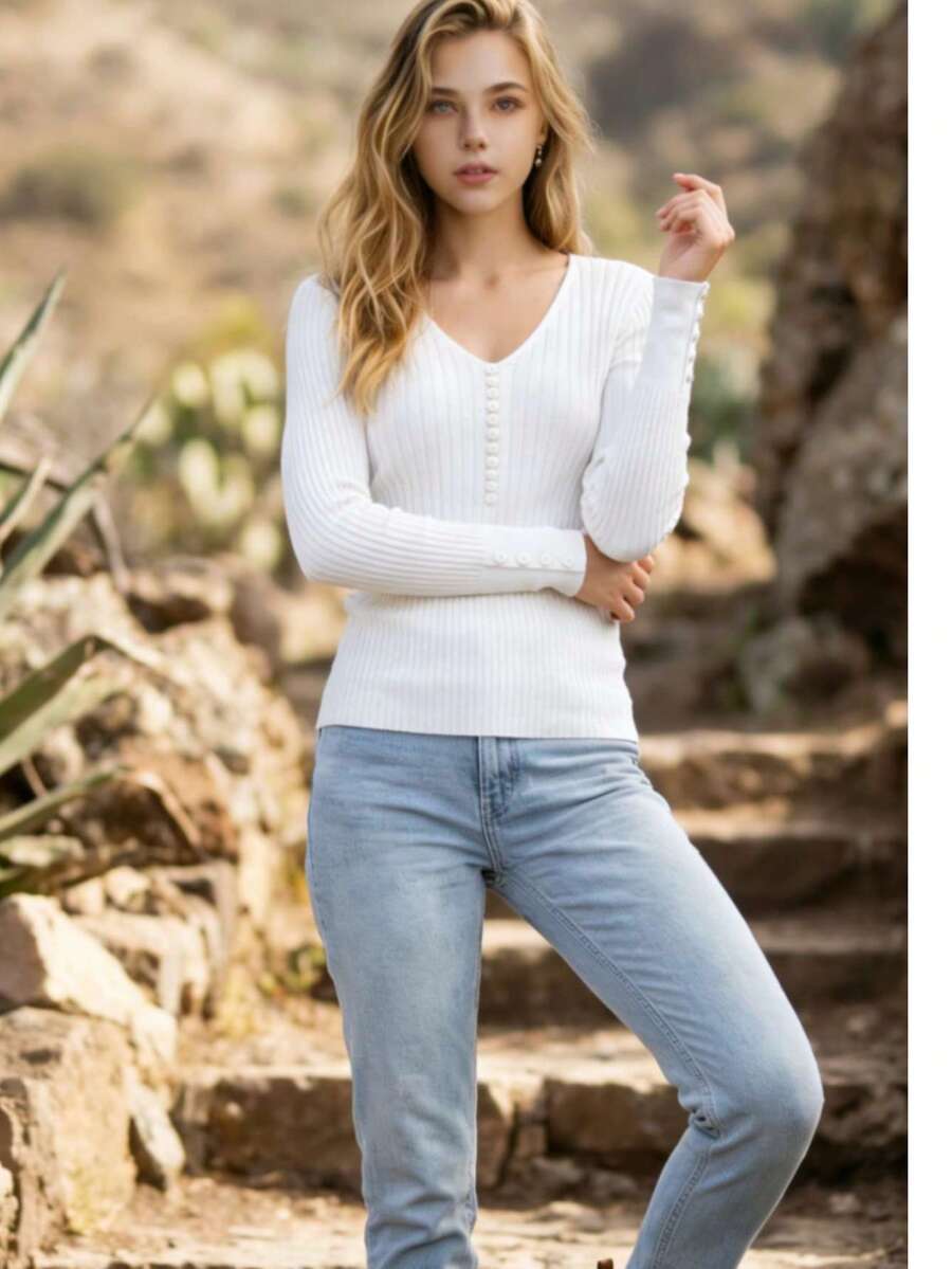 Blusa feminina importada em modal. O tecido é muito macio e confortável. Possui botões nas mangas e é tamanho único, mas tem excelente elasticidade e veste do tamanho36 ao 44. - Branco - Visão 1