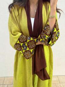 一件优雅经典的波西米亚风长袍，采用多色几何印花图案设计。适合所有季节和文化活动，休闲和正式场合皆宜。是各种派对、节日和旅行的理想之选。 - 黃色 - 查看 2