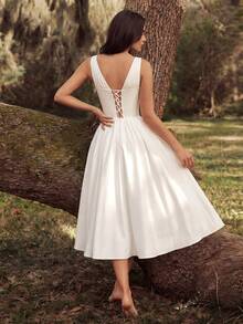 Đầm dạ hội nữ thanh lịch không tay cổ chữ V sâu, xếp ly xương cá, eo cao, buộc dây sau, dáng xòe dài đến đầu gối, thích hợp cho tiệc prom, sinh nhật, hẹn hò buổi tối, tiệc cưới, tiệc cocktail, lễ hội gia đình, mùa xuân, màu trắng. - trắng - Xem 2