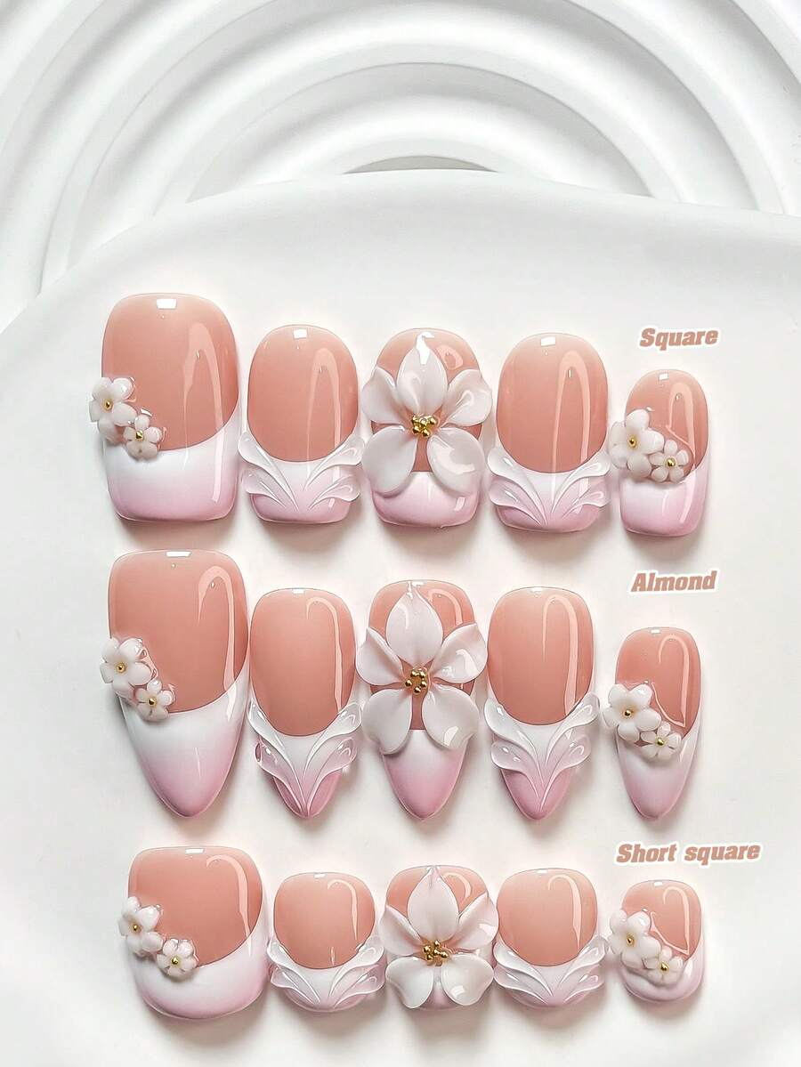 10件套通勤风手工美甲套装，包含凝胶指甲油套装、手工五瓣白花美甲装饰、3D白色山茶花、手绘纯色波纹、粉白指甲油，以及美甲工具（1个果冻贴纸+1个指甲锉）。提供三种尺寸：方形、短方形和杏仁形指甲。适合派对、日常佩戴、聚会、拍照、约会、春夏通勤等场合。 - 彩色 - 查看 1