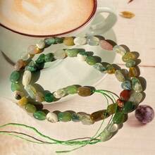 1串（40-45颗）天然宝石抛光珠，包括紫水晶、黄水晶、白水晶、绿东陵石、粉晶、月光石，不规则串在弹力绳上，可作手链、手镯或水晶手链佩戴。 - 彩色 - 查看 32