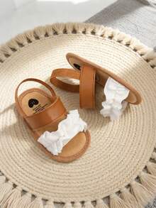 Dép xăng đan đế mềm mùa hè cho bé gái, kiểu dáng dễ thương với bèo nhún, có thể điều chỉnh độ dài, chống trơn trượt. Giày tập đi cho bé sơ sinh. - màu nâu - Xem 10
