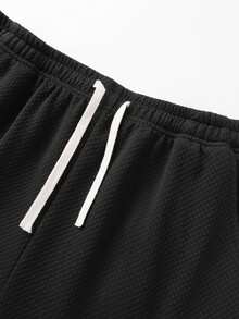 Bộ đồ nam 2 mảnh màu đen dệt kim kiểu waffle gồm áo tank top không tay và quần short, kiểu dáng thoải mái, nhẹ, thoáng khí, cổ tròn, phong cách Hawaii, có thể giặt máy, trang phục đa năng cho kỳ nghỉ hè. - màu đen - Xem 8
