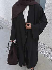 Bata de mujer de unicolor y elegante, chaqueta casual suave y cómoda, bata de diario y vacaciones, corte holgado en color negro - Negro - Ver 1