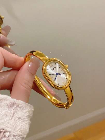 1 件女士金色椭圆形石英表，优雅时尚，适合日常佩戴、生日、毕业礼物、休闲、派对等场合。