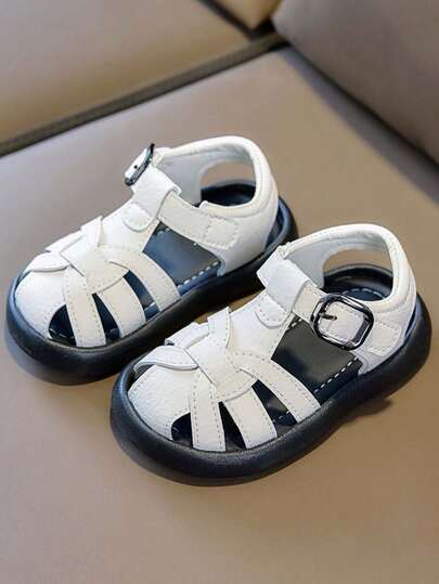 1 đôi dép xăng đan mùa hè cho bé, dép đi biển chống trượt đế mềm, thiết kế rỗng, chống đá cho bé trai và bé gái.