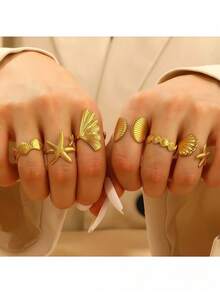 6枚粗金海星贝壳戒指，时尚精致，女士专属。夏季海滩叠戴不锈钢戒指。冲浪者的时尚宣言。海滩波西米亚风珠宝礼品。 - 金色 - 查看 2