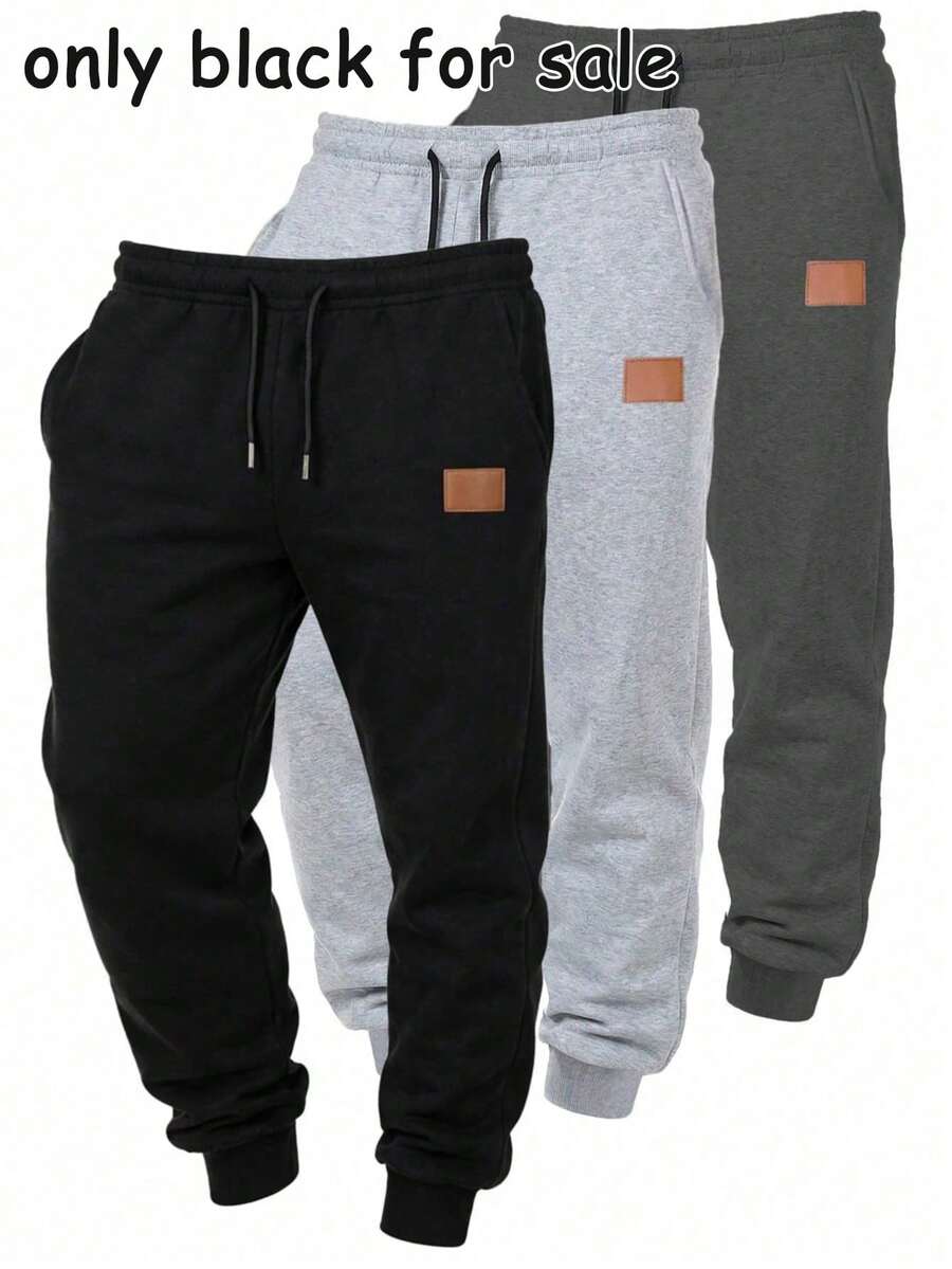 1 chiếc quần dài nam dáng rộng có dây rút, thích hợp mặc hàng ngày và chơi thể thao. Chiếc quần dáng thoải mái này được làm từ vải dệt kim, có ống quần thu hẹp dần xuống, thân thiện với da và co giãn tốt. Đây là món quà hoàn hảo dành cho bạn trai, chồng hoặc người thân trong gia đình. Chiếc quần này thể hiện vẻ đẹp của sự đơn giản và thời trang. - màu đen - Xem 1