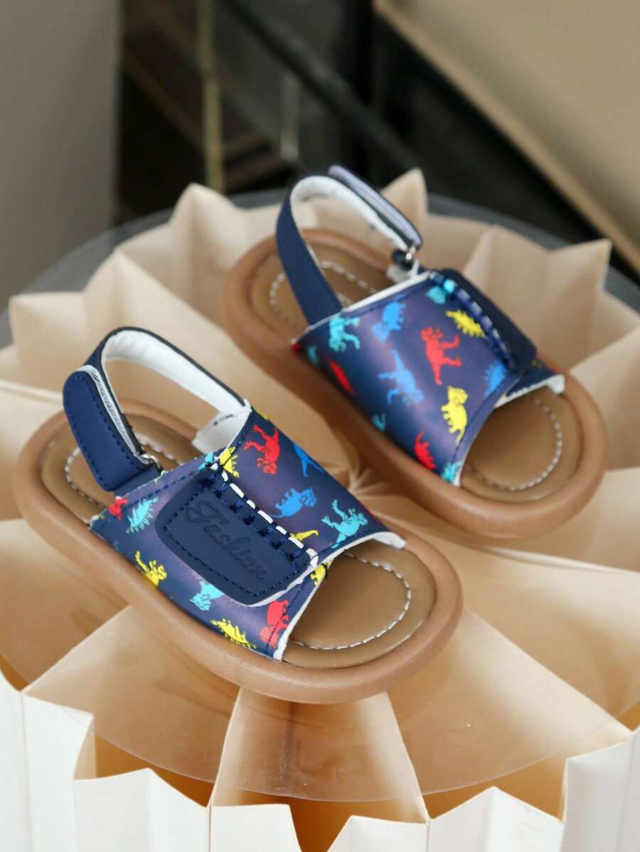 1双婴儿恐龙印花露趾凉鞋,软底防滑幼儿学步鞋,白色/藏蓝色可选,PU皮革材质,卡通恐龙图案,搭扣设计方便调节,圆头保护,橡胶防滑鞋底,透气舒适,适合0-3岁宝宝夏季户外活动、玩耍和幼儿园穿着 - 寶藍色 - 查看 1