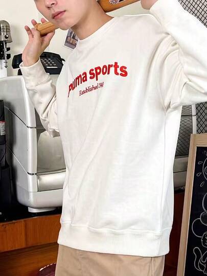  Áo sweatshirt dài tay cổ tròn in chữ phối màu PUMA dành cho nam, màu trắng và đỏ.