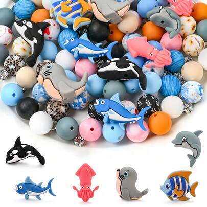 15pcs Marine Animal Silicone Bead Set: Cute Dolphin/Squid/Tropical Fish Shaped Beads Paired With Printed Round Beads. Easily DIY Jewelry Making: Bracelets, Necklaces, Beaded Pens, Phone Charms, Keychains, And Bag Accessories.