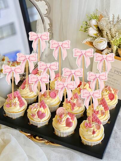 12个粉色蝴蝶结纸杯装饰，可爱的纸蝴蝶结装饰，适合装饰杯子，是蝴蝶主题蛋糕拍照的完美道具，也适合单身派对、婚礼、生日、婴儿派对和粉色主题派对装饰。