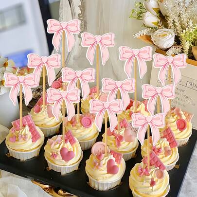 12个粉色蝴蝶结纸杯装饰，可爱的纸蝴蝶结装饰，适合装饰杯子，是蝴蝶主题蛋糕拍照的完美道具，也适合单身派对、婚礼、生日、婴儿派对和粉色主题派对装饰。