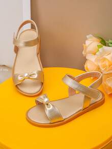 A Pair Of Champagne Sandals In Spring And Summer, Decorated With Exquisite Bows, Have A Sweet Style, Which Is Very Suitable For Matching Dresses And Other Clothing, And Is Suitable For Holiday Play And Daily Life. - Gold - View 1