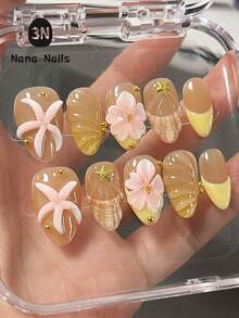 1 Paquete/10 Piezas Uñas Cortas de Almendra, Uñas Postizas de Fantasía para Niñas y Mujeres: Estrella de Mar Rosa Adorable, Conchas Blancas, Estrellas Doradas Brillantes y Perlas sobre Bases Translúcidas Claras y Rosas | Arte de Uñas con Tema Oceánico y de Sirena para Vacaciones, Boda en la Playa, Fiesta de Piscina o Vacaciones Tropicales | Fácil de Aplicar, Uñas Postizas Reutilizables con Formas Cómodas de Almendra y Ovaladas - Amarillo - Ver 2