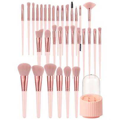 Bộ dụng cụ trang điểm 33 món bao gồm: Bộ 32 cọ trang điểm + 1 hộp đựng.