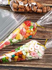 50 piezas Bolsas transparentes con forma de cono, bolsas de regalo, bolsas de caramelos, bolsas de dulces, bolsas de postres, bolsas de aperitivos, bolsas de palomitas de maíz, bolsas de fiesta, envoltorios, suministros para fiestas de cumpleaños, decoraciones de cumpleaños, suministros para bodas, regalos de cumpleaños, recuerdos de fiesta, decoraciones para baby shower, despedida de soltera, fiesta de revelación de género, decoraciones de cumpleaños para el hogar - Bolsa cónica transparente - Ver 8