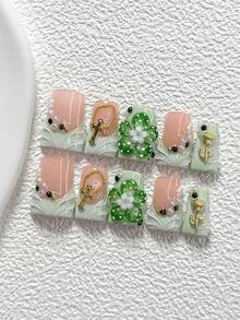 10件套森林主题优雅手工美甲套装，凝胶美甲贴片，包含小花朵、3D玫瑰、十字架、绿色水钻美甲配件、手工捏制五瓣花美甲装饰、绿色指甲油，清新风格，附赠美甲工具（1张果冻贴片+1把指甲锉），三种尺寸可选：杏仁形、鸭形、棺材形美甲，适合聚会、日常、派对、拍照、玩乐、春夏、通勤等场合。 - 彩色 - 查看 2
