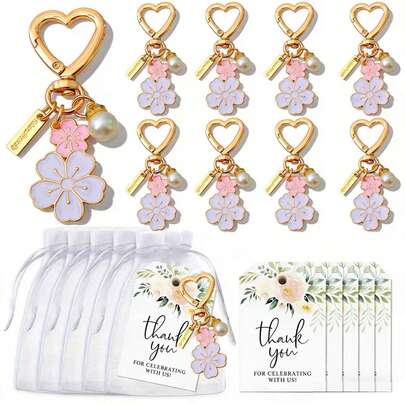 Juego de 12 llaveros con forma de corazón - Incluye llaveros con flores, etiquetas de agradecimiento y bolsas de regalo. El colgante de llavero de aleación con doble flor es perfecto para ocasiones como empleados, voluntarios, bodas, cumpleaños, jubilaciones, productos básicos a granel, mini accesorios, regalos del Día de la Madre, regalos para damas de honor y padrinos, regalos de despedida de soltero, regalos de cumpleaños, regalos para damas de honor, regalos de graduación, regalos del Día del Maestro, artículos de viaje, decoración del hogar, etc.