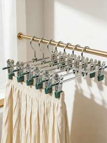 10 piezas Perchas de metal para adultos con agarres antideslizantes y abrazaderas ajustables para pantalones, jeans, faldas y vestidos. Solución de almacenamiento y organización de armario que ahorra espacio. Perchas de acero inoxidable de alta resistencia - Negro - Ver 9