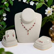 Bộ trang sức thời trang và thanh lịch dành cho nữ, bao gồm dây chuyền, bông tai và vòng tay. - Bạc - Xem 4