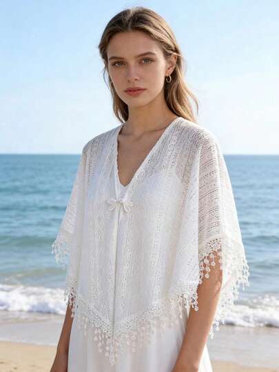 1件新款白色蕾丝流苏披肩晚礼服，女士夏季盘扣开衫防晒披肩