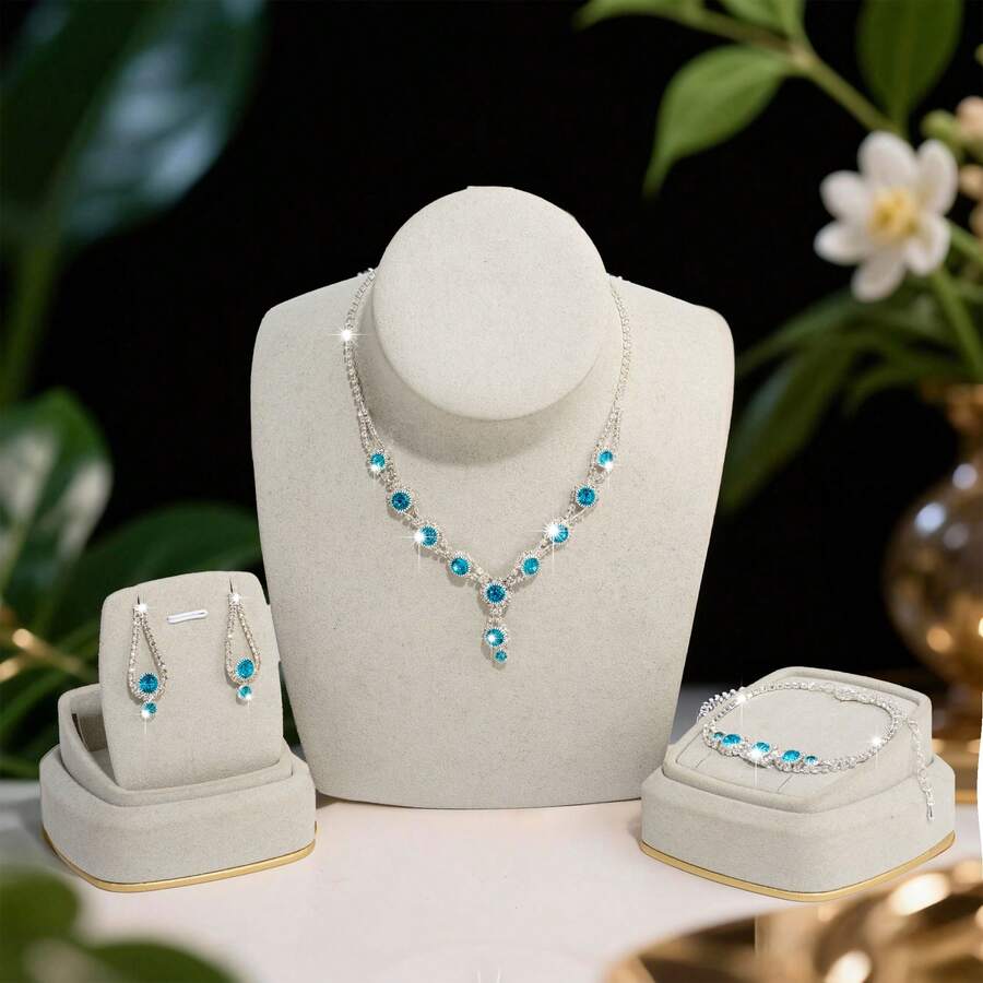Bộ trang sức thời trang và thanh lịch dành cho nữ, bao gồm dây chuyền, bông tai và vòng tay. - Bạc - Xem 1