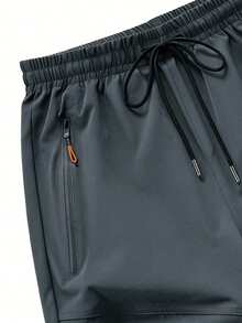 Quần short thể thao nam dài đến đầu gối, nhanh khô, thoáng khí, có chun co giãn và túi, thích hợp cho bãi biển, hoạt động ngoài trời, hồ bơi và tập luyện. - Xám - Xem 4