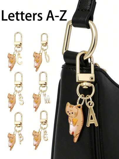 Móc khóa chữ vàng thanh lịch với mặt dây chuyền hình mèo con vàng, mặt dây chuyền chữ cái 3D từ A-Z, vòng móc khóa hợp kim thời trang, phụ kiện trang trí túi xách, ba lô, móc chìa khóa xe hơi, phụ kiện hoàn hảo cho phụ nữ sử dụng hàng ngày, móc khóa cổ điển và đơn giản, vật trang trí, phụ kiện túi xách, thích hợp để tặng bạn bè, gia đình, người yêu, bạn gái, quà tặng quan trọng, quà tặng ngày Valentine, quà tặng ngày của Mẹ.