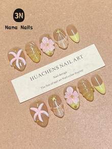 1 Paquete/10 Piezas Uñas Cortas de Almendra, Uñas Postizas de Fantasía para Niñas y Mujeres: Estrella de Mar Rosa Adorable, Conchas Blancas, Estrellas Doradas Brillantes y Perlas sobre Bases Translúcidas Claras y Rosas | Arte de Uñas con Tema Oceánico y de Sirena para Vacaciones, Boda en la Playa, Fiesta de Piscina o Vacaciones Tropicales | Fácil de Aplicar, Uñas Postizas Reutilizables con Formas Cómodas de Almendra y Ovaladas - Amarillo - Ver 1