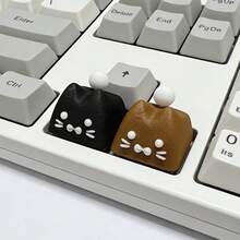 1 个可爱又别致的猫咪造型键帽；键帽采用十字形按键，材质为树脂。此键盘仅赠送一个键帽。 - 查看 6