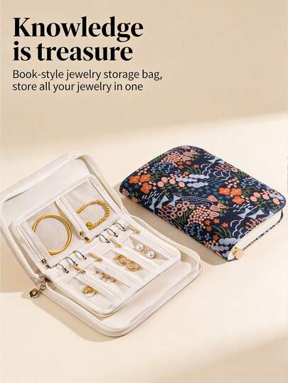 刺绣首饰收纳袋 - 一款便携式大容量布袋，具有防氧化保护功能。这款收纳袋非常适合存放金银饰品，采用多层设计和巧妙隔层，是整齐收纳耳环、项链和其他首饰的理想之选。