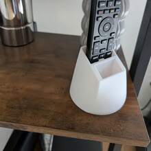 Giá đỡ điều khiển từ xa - Hộp đựng đồ dùng văn phòng tiện dụng, thích hợp để đựng điều khiển từ xa của TV, máy lạnh, đèn và các vật dụng văn phòng phẩm, có thể chứa 2 điều khiển từ xa, không cần nguồn điện. - A - Xem 10