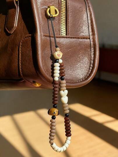 1 قطعة سيور هاتف زخرفية بخرز على شكل جرو نشيط، ذات ألوان رجعية مانعة للفقدان (قد تختلف الحجم الفعلي قليلاً عن الصورة بسبب زاوية التصوير والتكبير)، تميمة هاتف، إكسسوار هاتف، سير معصم للهاتف الذكي