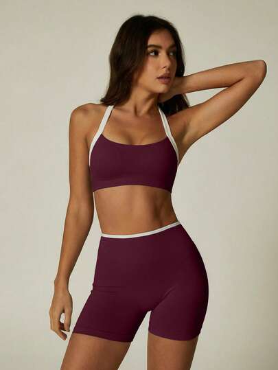 UONNOU Bộ đồ định hình thể thao nữ 2 món gồm áo ngực và quần short. Thiết kế gợi cảm với cổ yếm, hở lưng, áo croptop, giúp thon gọn eo và nâng mông. Quần short thể thao bằng vải không đường may được phối hoàn hảo. Thích hợp cho tập thể dục, yoga, chạy bộ và mặc hàng ngày.