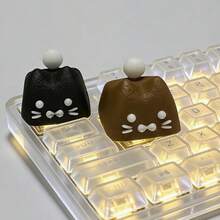 1 个可爱又别致的猫咪造型键帽；键帽采用十字形按键，材质为树脂。此键盘仅赠送一个键帽。 - 查看 9