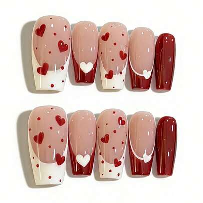 Bộ 10 chiếc này sở hữu gam màu lãng mạn gồm hồng nude nhẹ nhàng và đỏ burgundy đậm, được tô điểm bằng họa tiết trái tim tinh nghịch và thiết kế đầu móng kiểu Pháp cổ điển, toát lên vẻ ngọt ngào và quyến rũ nữ tính. Lớp sơn bóng cao cấp và hình dáng thon dài tạo hiệu ứng mượt mà, giúp bàn tay trông thon gọn hơn và có khả năng làm sáng da đáng kể. Kiểu dáng quyến rũ này hoàn hảo để thêm chút yêu thương vào bất kỳ trang phục nào, lý tưởng cho các buổi hẹn hò, ngày Valentine, những chuyến đi chơi hàng ngày và các buổi tụ họp lễ hội.