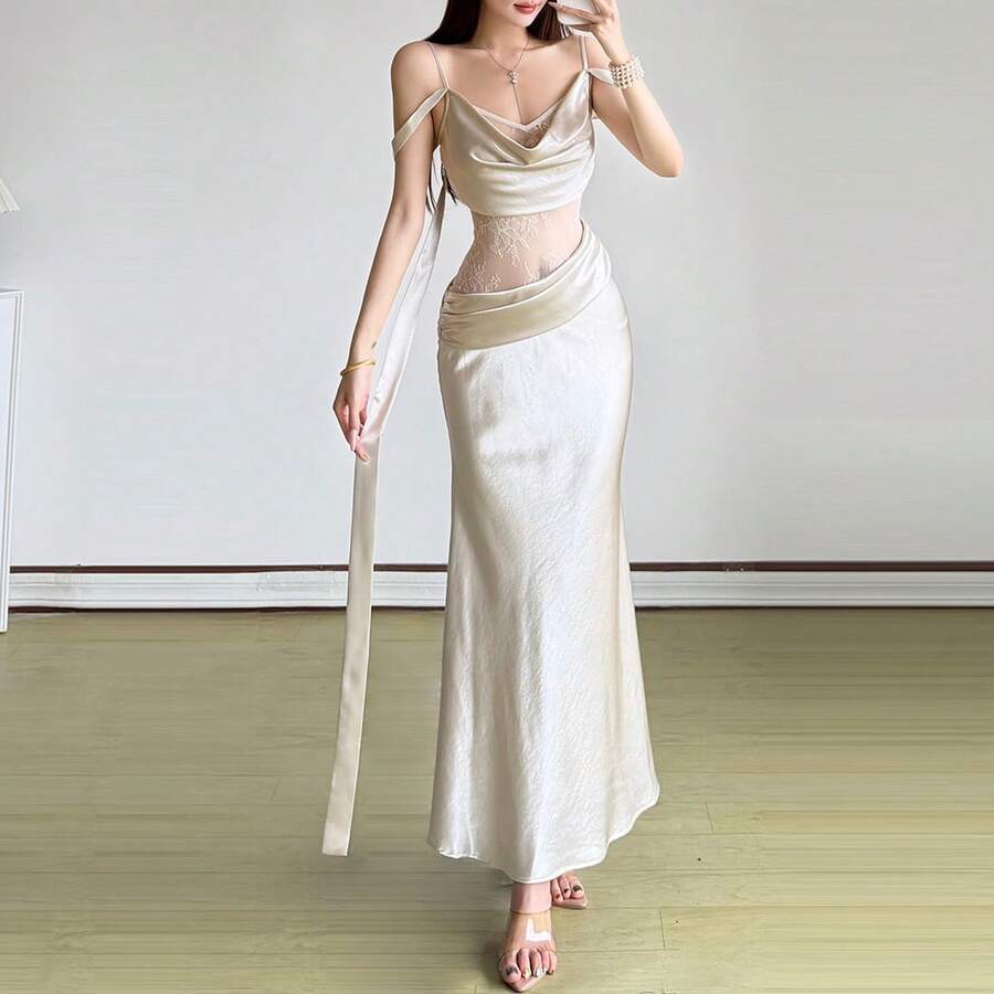 Đầm dài dáng chữ A thanh lịch và gợi cảm dành cho nữ, được làm từ chất liệu vải dệt kim co giãn nhẹ, có cổ chữ V, thiết kế không tay và chi tiết hở lưng, phù hợp cho các dịp tiệc tùng. - Màu be - Xem 1