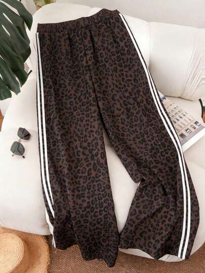 大码女式豹纹弹力腰裤，侧边条纹装饰，春季款