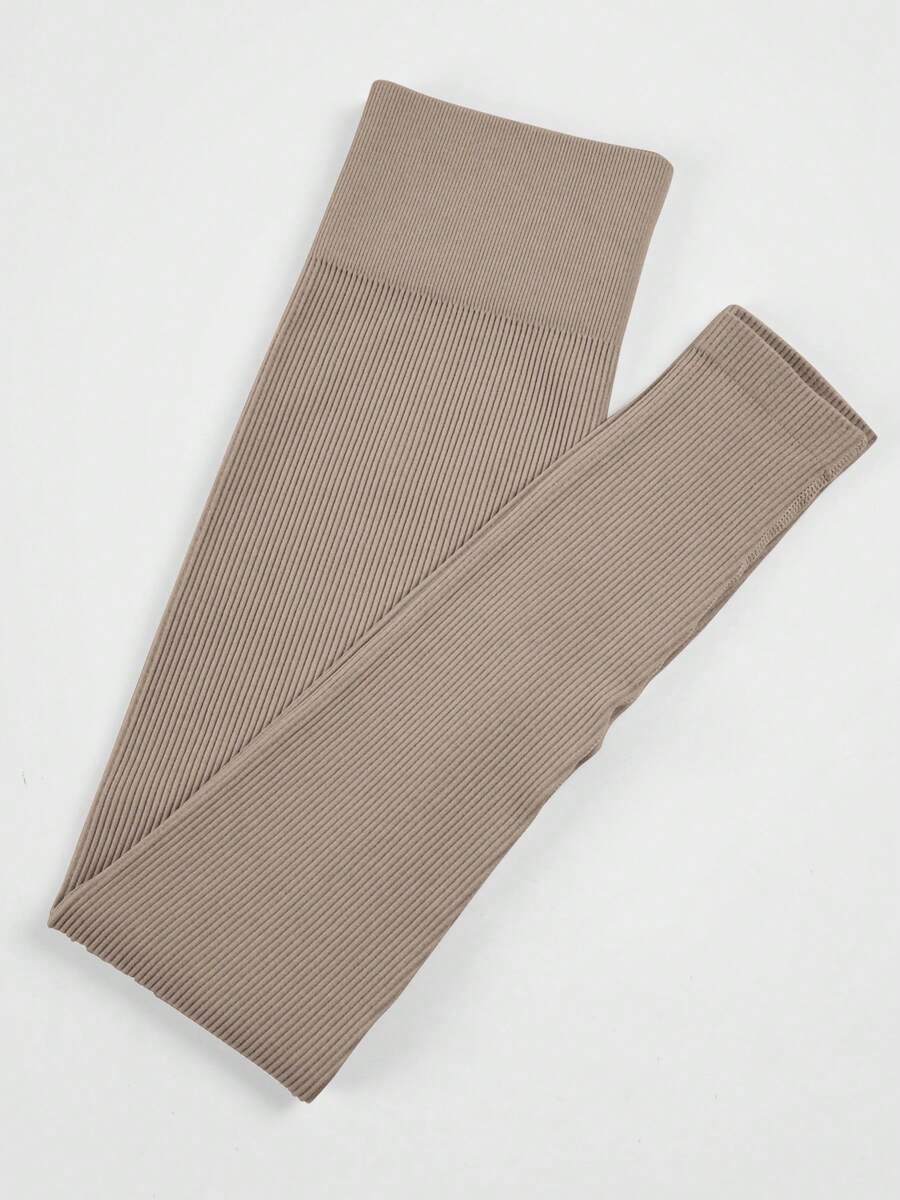 1 chiếc quần legging nữ dáng lửng, chất liệu vải co giãn cao, co giãn tốt, kiểu dệt gân. - Màu Khaki - Xem 1