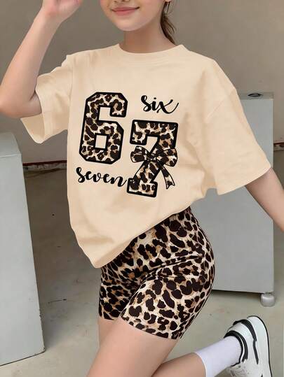 Bộ 2 món cho bé gái, gồm áo thun ngắn tay cổ tròn in họa tiết da báo "67" và quần legging ngắn in họa tiết da báo ngẫu nhiên, trang phục thời trang xuân hè, hàng mới về.