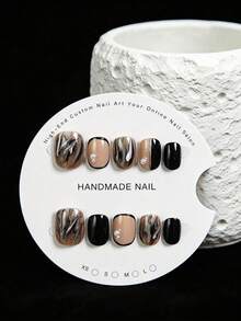 10片手工制作的短款椭圆形按压式假指甲，边缘采用棕黑色大理石渐变效果，搭配黑色法式甲尖，并点缀有3D珍珠。这款精美的假指甲适合女性和女孩，是派对、婚礼和日常佩戴的完美之选，并附赠工具包。 - 彩色 - 查看 2