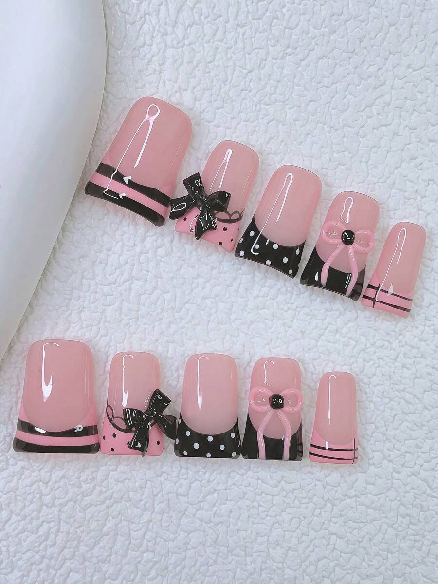 Bộ 10 móng giả Y2K Nails Chic Duckbill - Làm thủ công, móng màu hồng, móng màu đen, móng kiểu Pháp màu hồng và đen, thiết kế nơ 3D thủ công, nghệ thuật vẽ móng nơ hồng 3D, thiết kế chấm bi, sọc và ren đen vẽ tay.