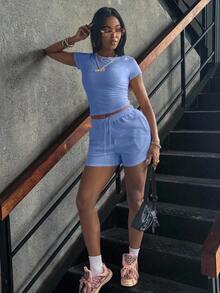 Conjunto de dos piezas para verano con camiseta de manga corta casual de unicolor de cuello redondo y shorts para mujeres - Celeste - Ver 3